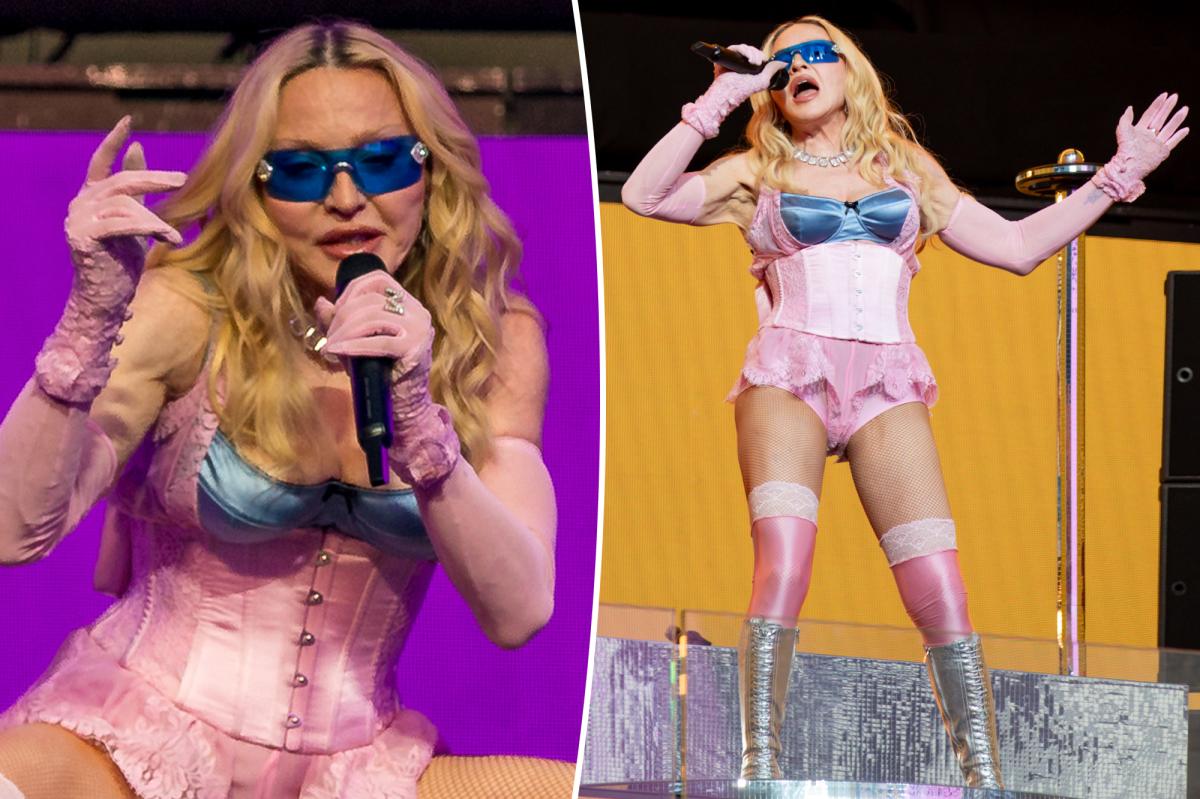 Madonna, 67, shocks in skintight pink corset at surprise NYC Times Square concert