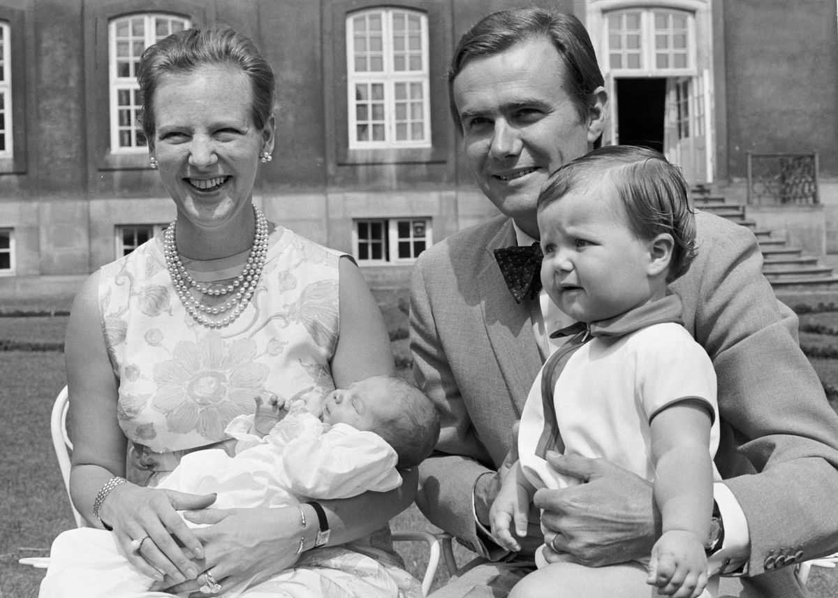 Picture taken in 1969 shows then Princess Margrethe of Denmark and Prince Henrik presenting their little newborn Prince Joachim while older brother Crown Prince Frederik looks on, at Fredenborg Castle, Denmark. 