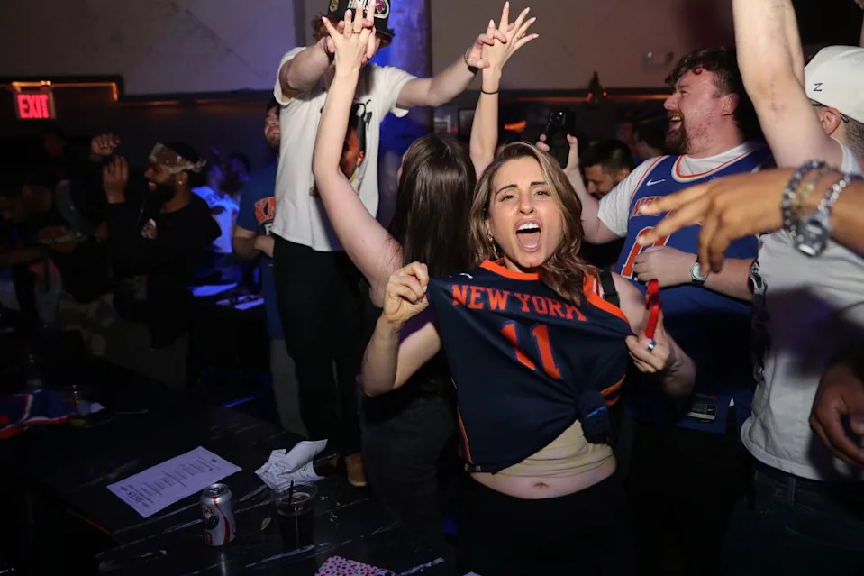 New Yorkers set off fireworks, erupted in booming cheers and chants of “Knicks in Five,” crazily honked, hugged each other, danced in the streets and sang in the subways. William C Lopez/NY Post