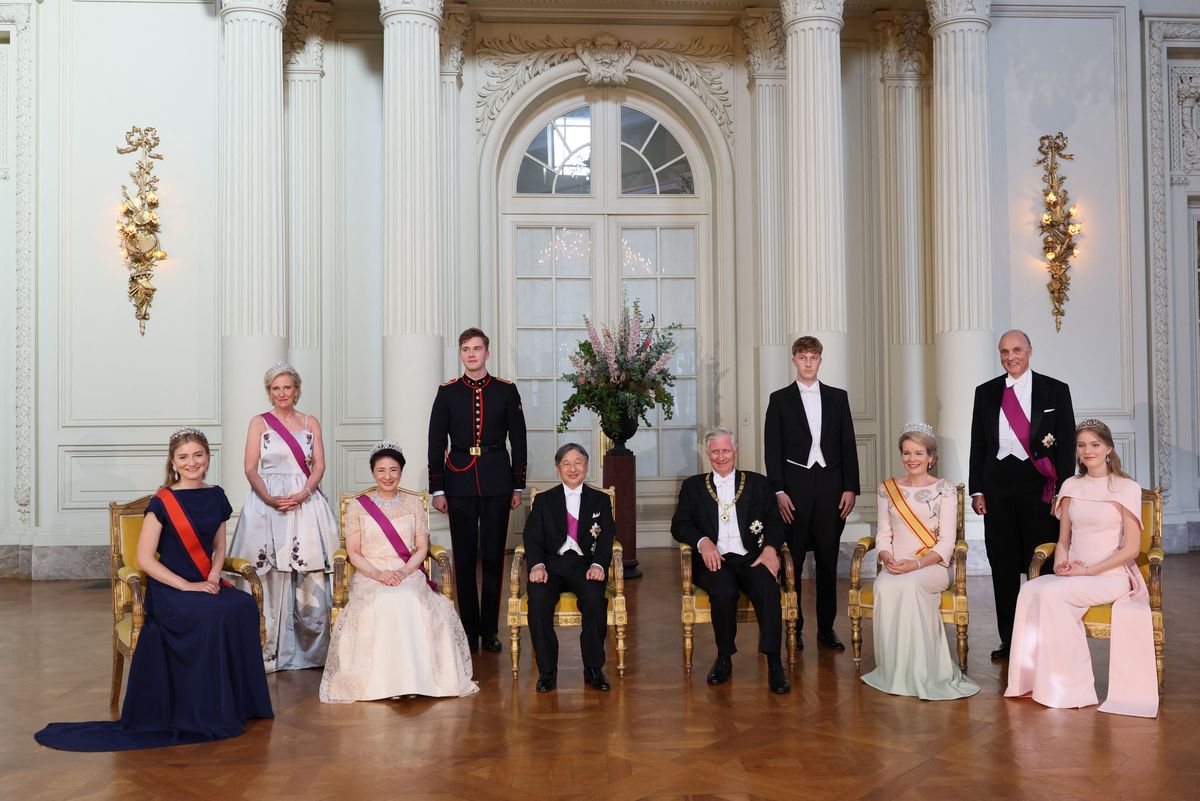 The Belgian queen's elegant outfit change highlighted the different demands of royal diplomacy and ceremonial tradition.