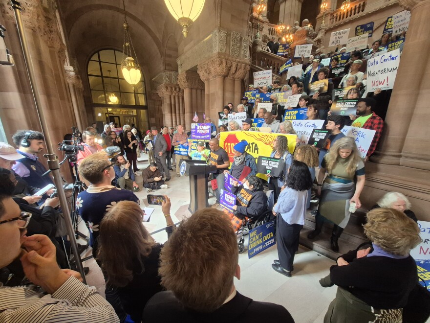 Advocates of a statewide moratorium on new data center projects rally on May 13, 2026, at the New York State Capitol.