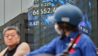 Tokyo's Nikkei 225 index tops 68,000 for the 1st time as Wall Street logs more records