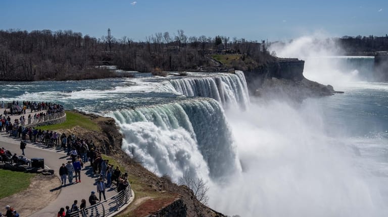 Niagara Falls, a natural marvel dating back over 12,000 years,...