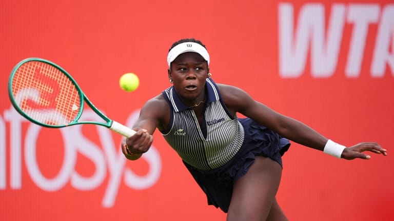Victoria Mboko of Canada in action against Karolina Pliskova of...