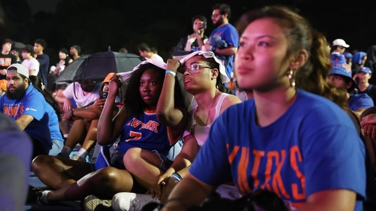 Knicks fans gather for a watch party inside Central Park...