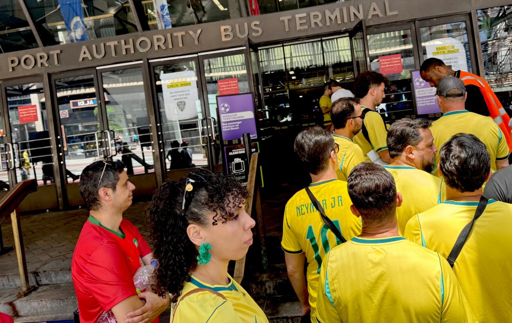 Pumped-up World Cup fans pack buses to watch Brazil vs. Morocco as games kick off here