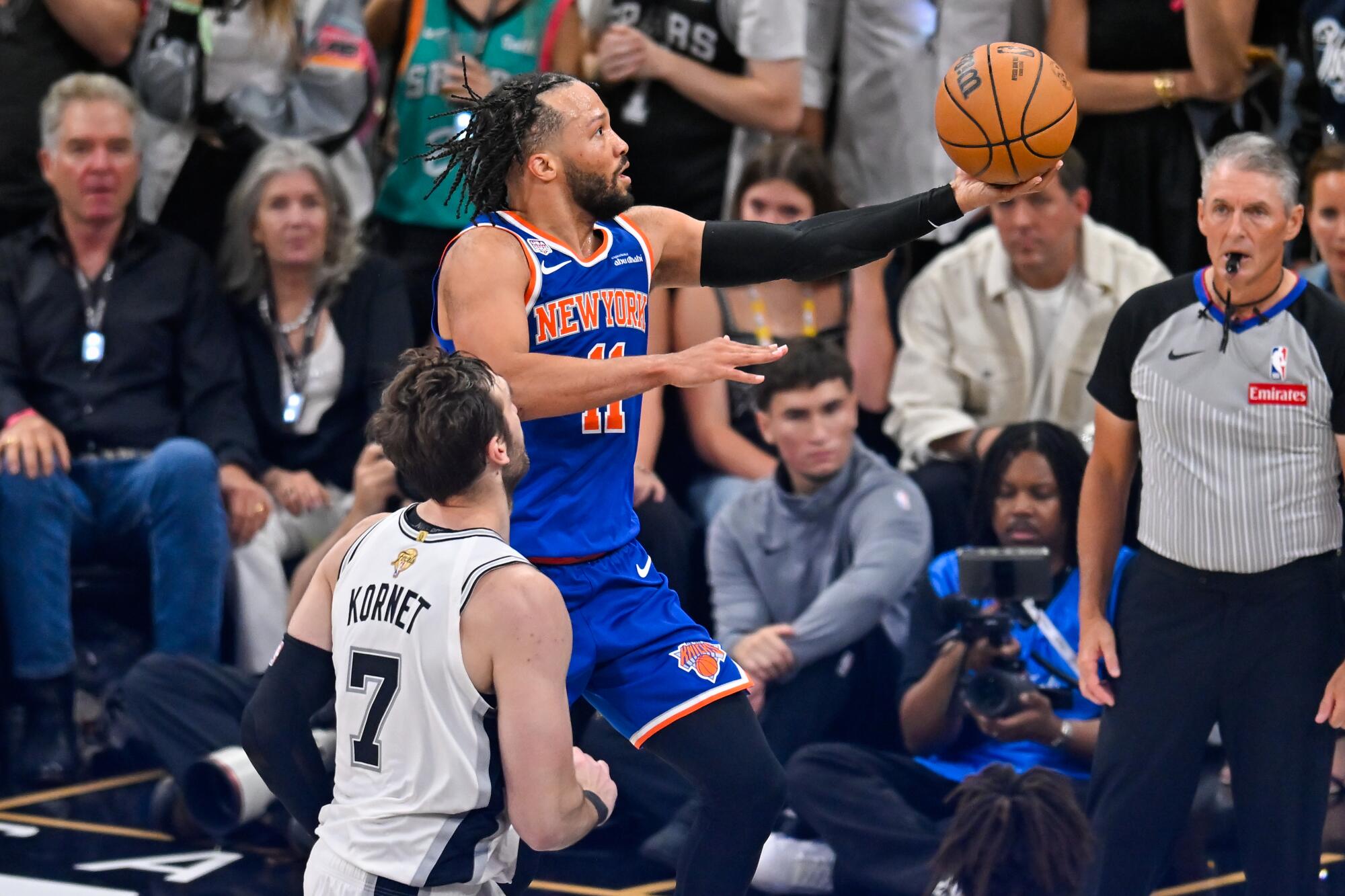 New York Knicks guard Jalen Brunson drives as San Antonio Spurs center Luke Kornet.