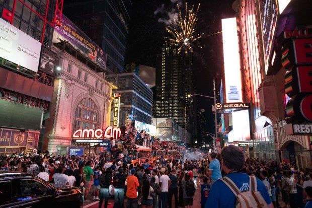 New York Knicks fans celebrate in Times Square after the Knicks defeated the San Antonio Spurs in the NBA Finals on Saturday, June 13, 2026 in Manhattan, New York. (Barry Williams/ New York Daily News)
