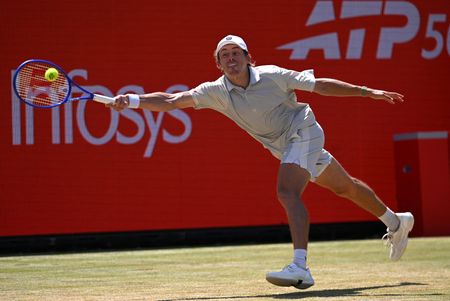 Tennis-De Minaur knocked out in quarter-finals at Queen's Club
