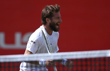 Tennis-Moutet loses nearly all Queen's prize money after sweary interview