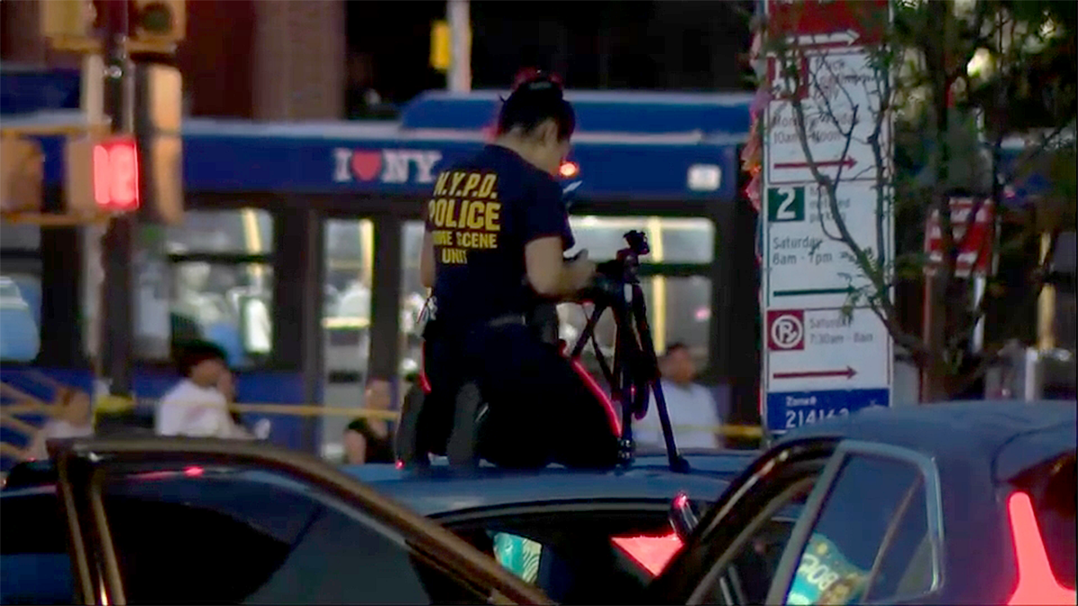 A cop on a police car in the Bronx