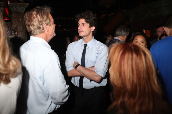 Democratic congressional candidate Jack Schlossberg greets supporters during an election night watch party Tuesday, June 23, 2026, in New York. (AP Photo/Heather Khalifa)