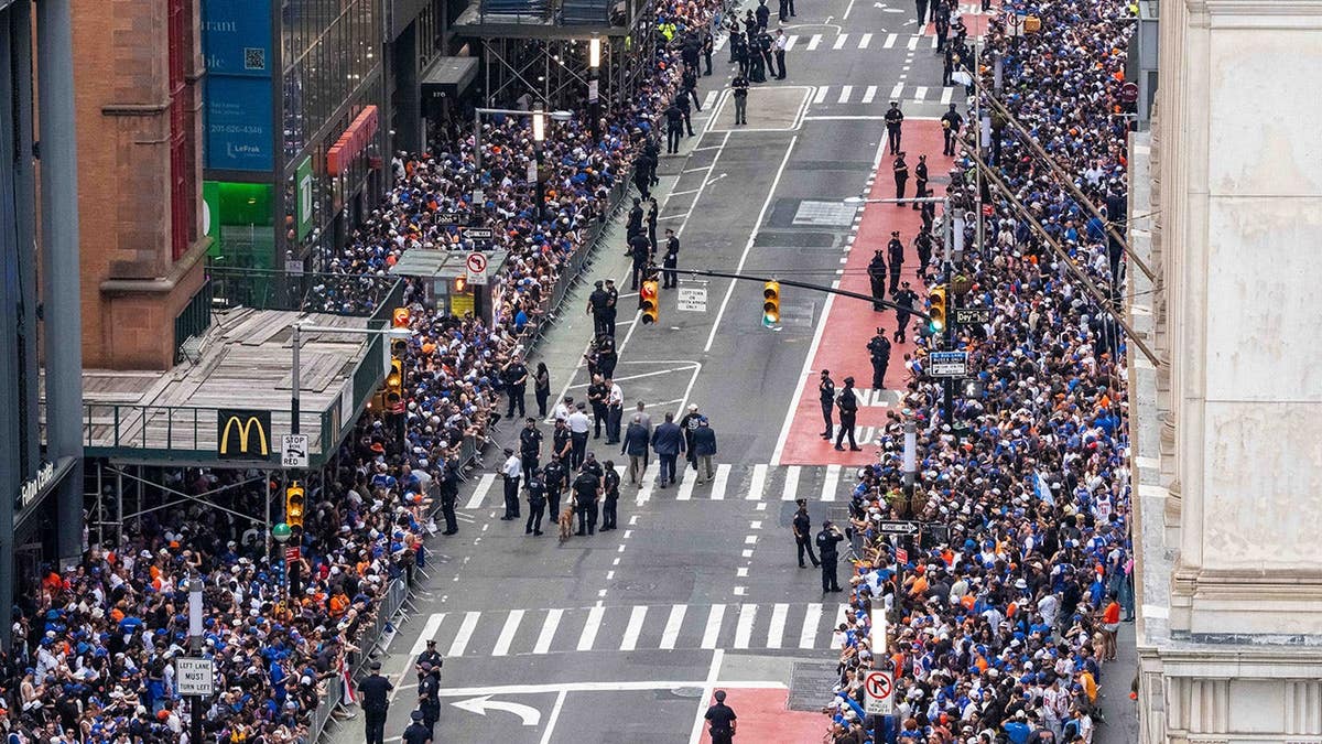 Thousands of fans lining Broadway in lower Manhattan for New York Knicks championship parade