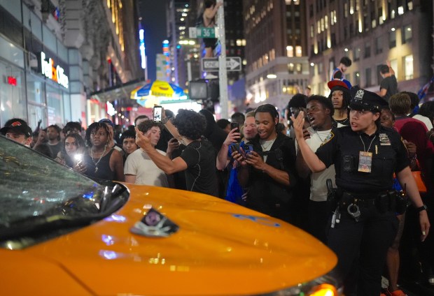 A taxi is pictured damaged after Knicks fans flooded the streets of Manhattan around Madison Square Garden on June 10, 2026. (Photo by Selcuk Acar/Anadolu via Getty Images)