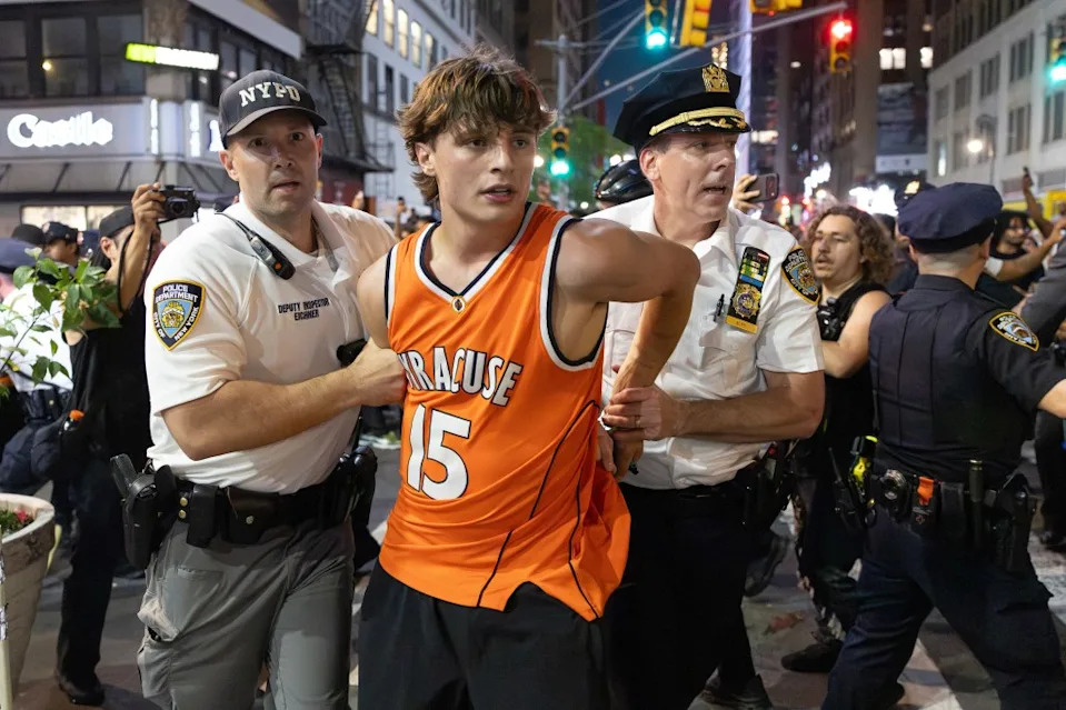NYPD makes arrests on 8th Avenue. Fans outside Madison Square Garden as the New York Knicks host the San Antonio Spurs in Game 4 of the NBA Finals. Aristide Economopoulos for NY Post