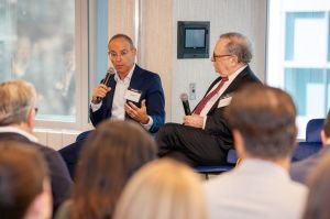 Miki Naftali (left) and Stuart Saft speak at a panel at the Commercial Observer Residential Forum.