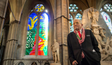 FILE PHOTO: British artist David Hockney poses in front of The Queen's Window, a new stained glass window he has designed,...