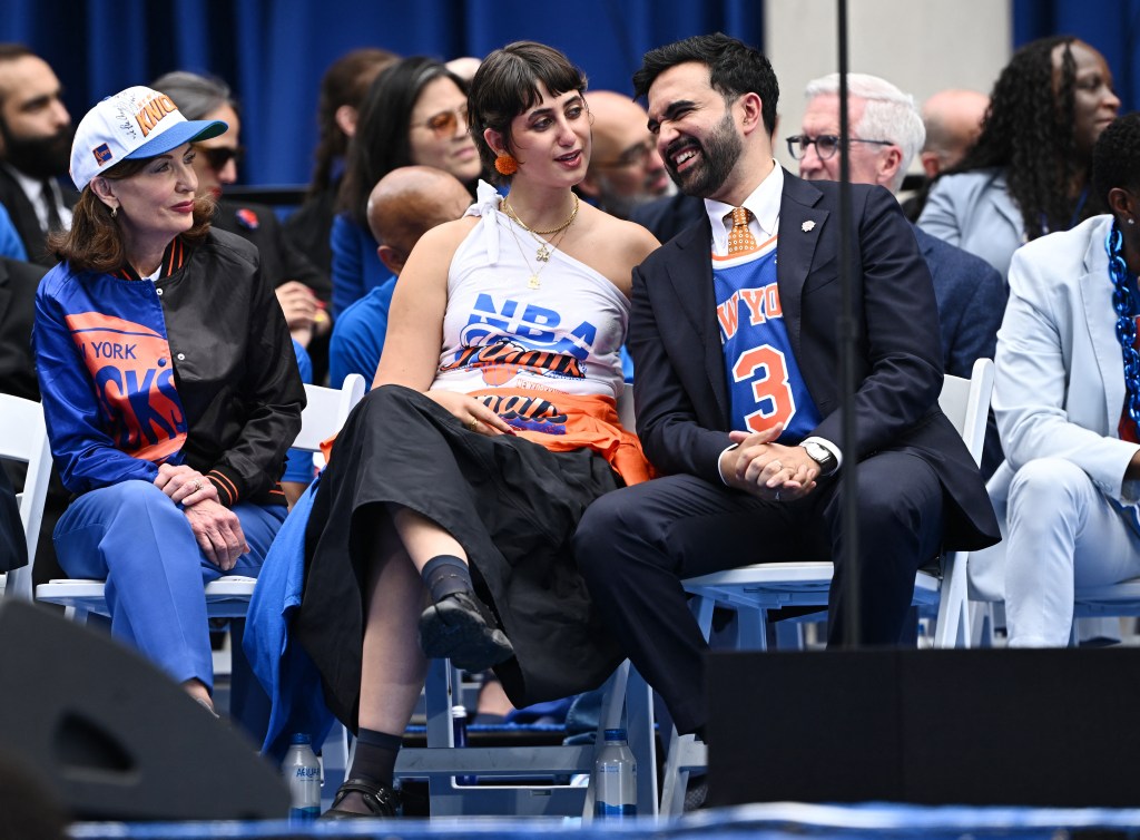 New York City Mayor Zohran Mamdani and his partner Rama Duwaji at New York City Hall during an NBA parade.