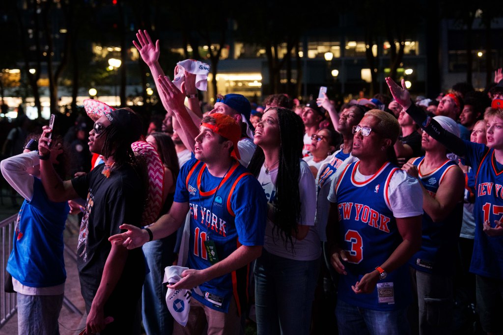 People react during a watch party in Bryant Park for Game 3 of the NBA Finals between New York Knicks and San Antonio Spurs on June 8, 2026 in New York City. 