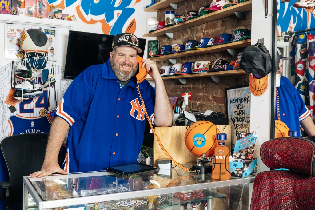 Owner of Mr. Throwback, Michael Spitz, in the East Village of Manhattan on June 4, 2026. Photographed by Emmy Park for NY Post. ADDING >>> the jacket that Michael is wearing is called:
"Hardwood Classic Warm-up by Mitchell & Ness 1990s, $250