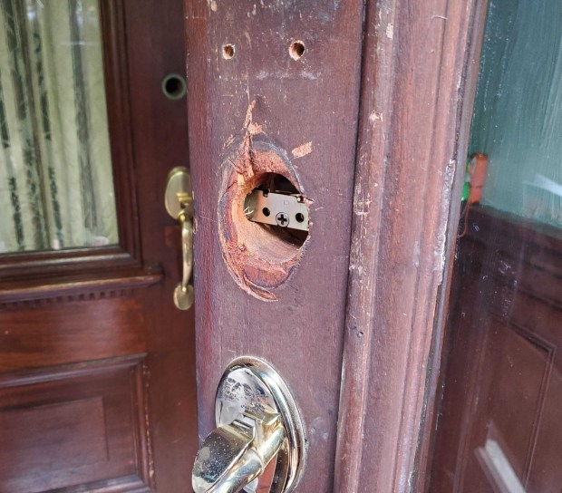 Damage to Carmella Charrington's door is pictured at her home on Jefferson Ave. in Bedford Stuyvesant, Brooklyn, on Wednesday, April 22, 2026, after officers attempted to execute a search warrant at the property. (Nicholas Williams / New York Daily News)