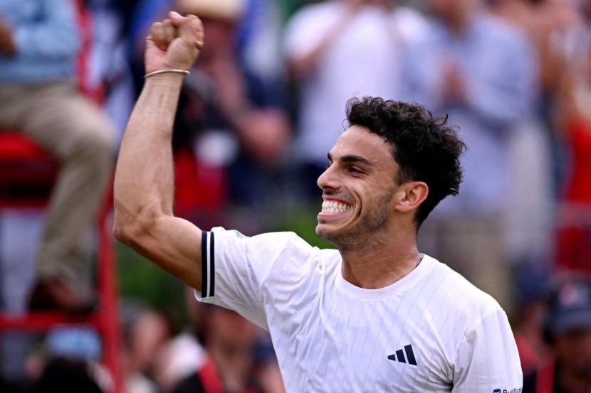 Argentina's Francisco Cerundolo celebrates winning his semi-final match against American Brandon Nakashima at the Queen's Club Championships at Queen's Club, London, Britain, on Saturday. Argentina's Francisco Cerundolo celebrates winning his semi-final match against American Brandon Nakashima at the Queen's Club Championships at Queen's Club, London, Britain, on Saturday.