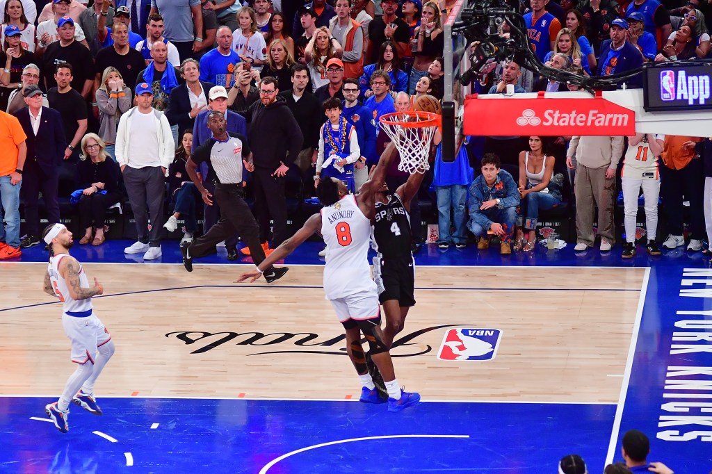 OG Anunoby #8 of the New York Knicks blocks De'Aaron Fox #4 of the San Antonio Spurs during Game Four of the 2026 NBA Finals on June 10, 2026 at Madison Square Garden in New York, New York