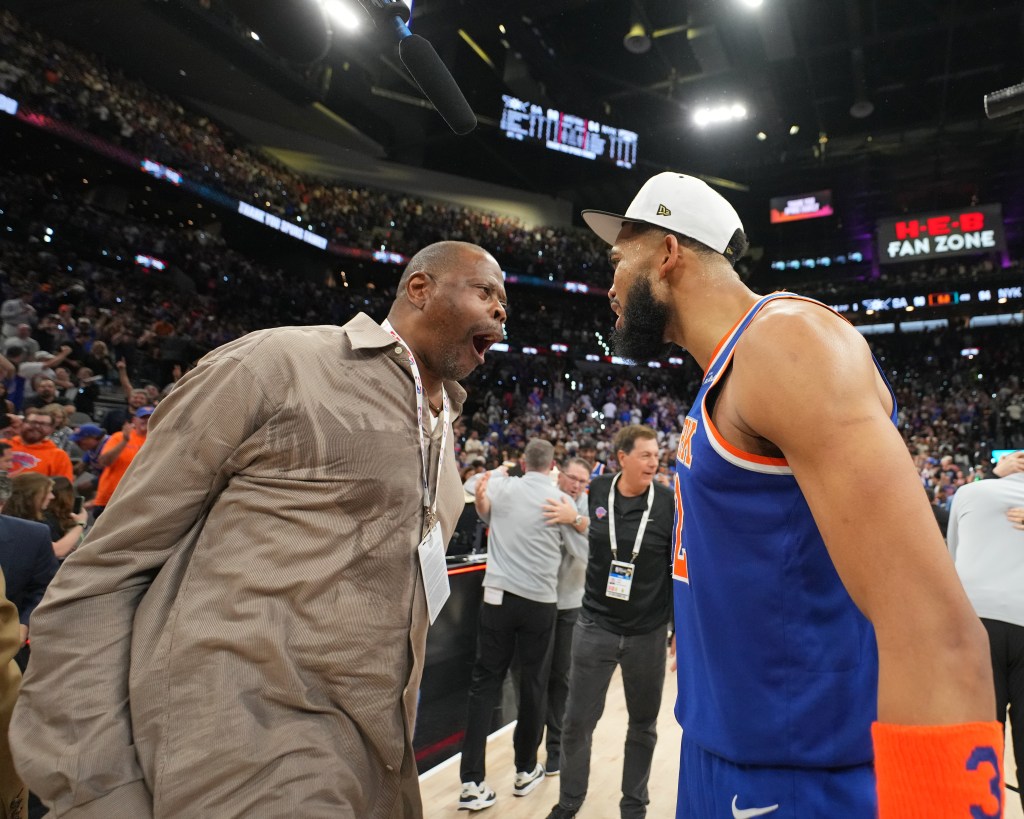 Patrick Ewing and Karl-Anthony Towns #32 of the New York Knicks celebrate after winning the NBA Finals against the San Antonio Spurs during Game Five of the 2026 NBA Finals on June 13, 2026 at Frost Bank Center in San Antonio, Texas. 