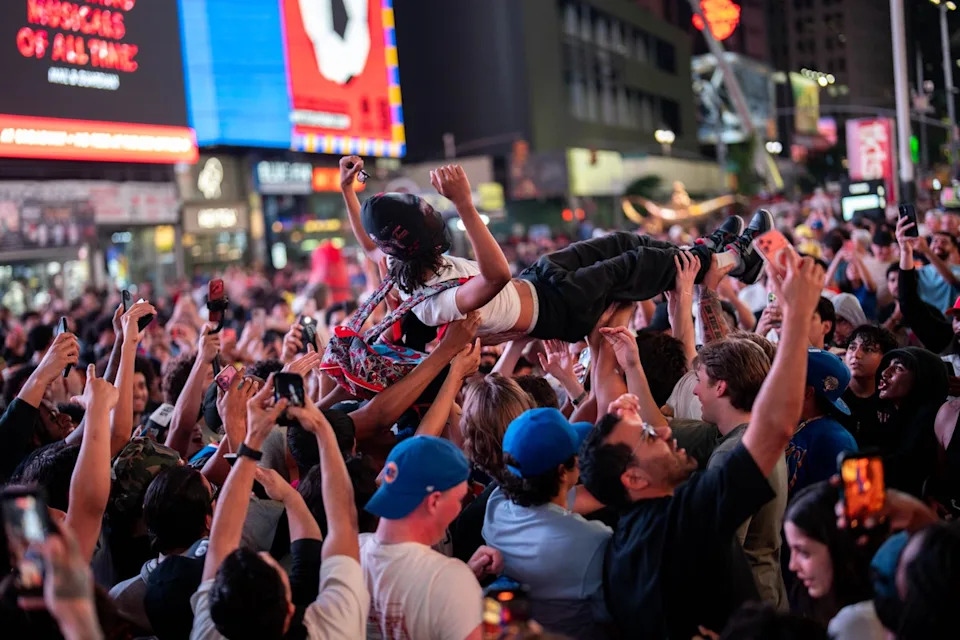 Knicks fans celebrate wildly after Wednesday night’s win (Getty)