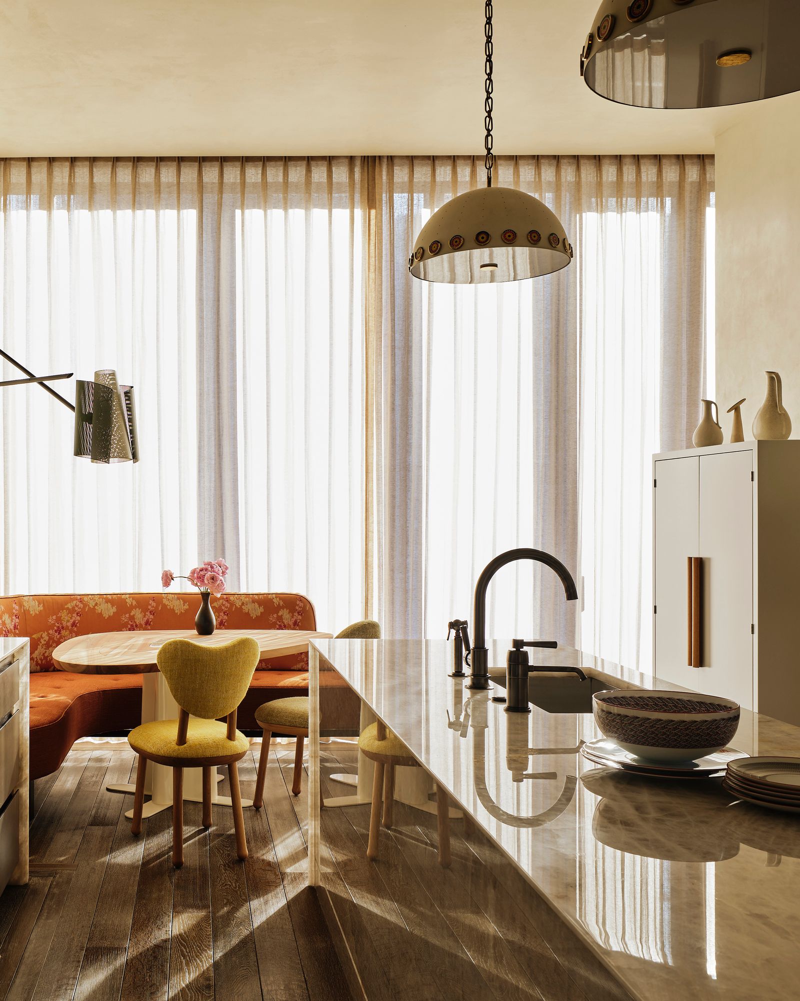 Image may contain Indoors Interior Design Home Decor Chair Furniture Floor and Window