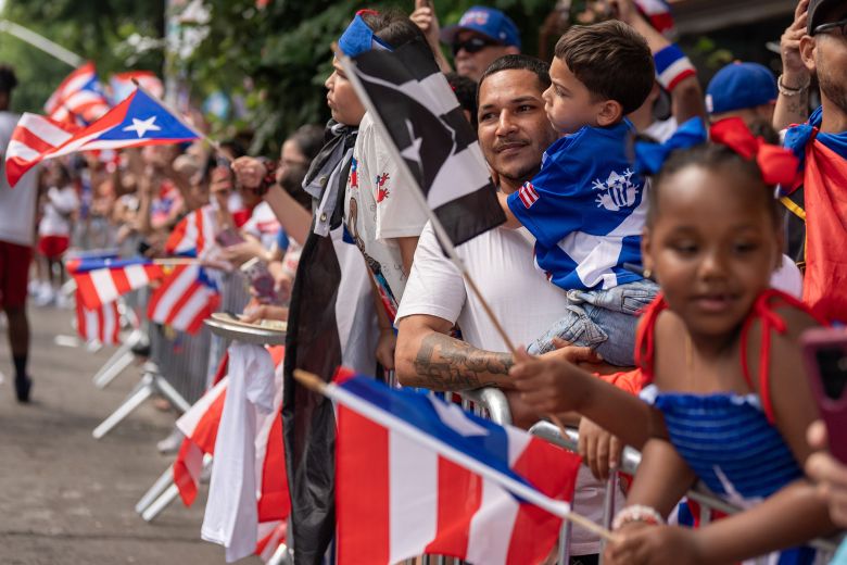 Festival-goers line up to watch the parade together in Bushwick.