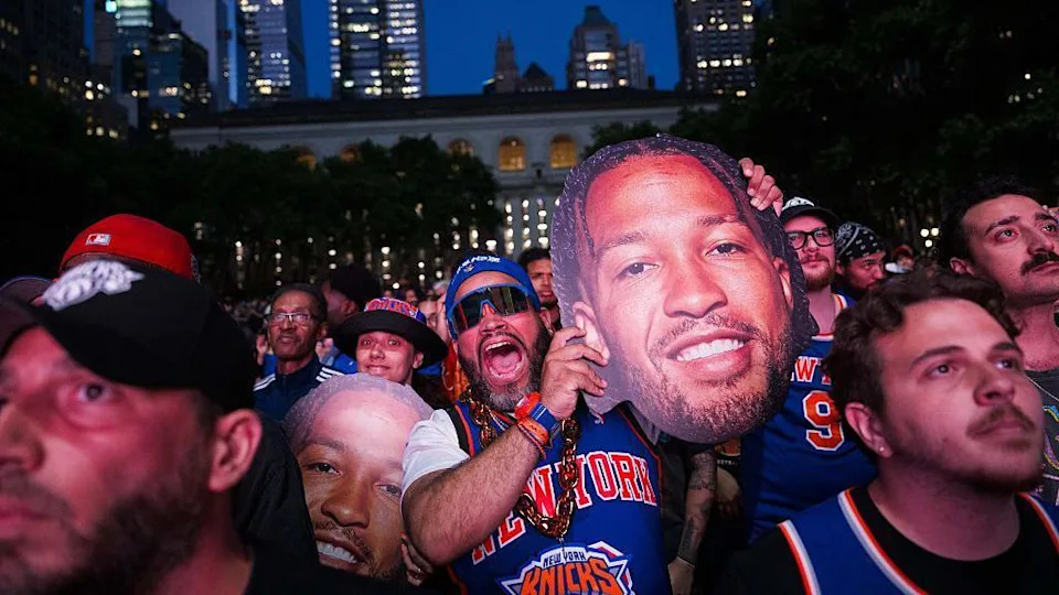 Knicks fans gather in a park in NYC