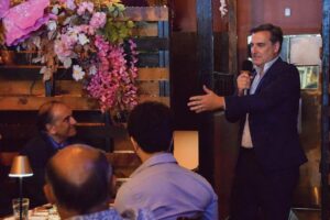 Senator Michael Gianaris, the guest speaker, spoke about his memories of Steinway Street growing up in Astoria.