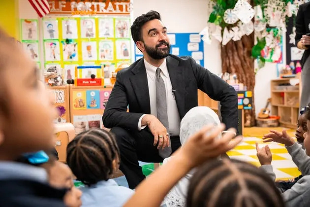 Mayor Zohran Mamdani interacts with children during a visit to Learning Through Play Pre-K with Former President Barack Obama in the Bronx in New York on April 18, 2026.