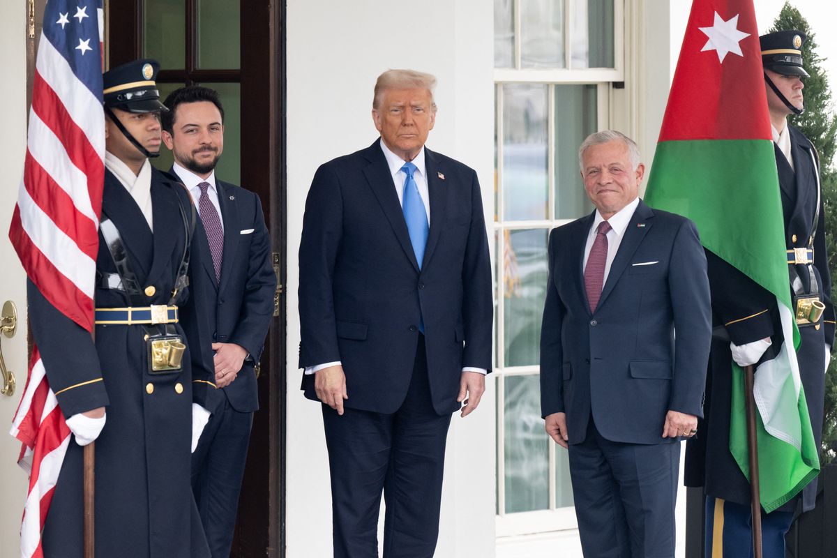 US President Donald Trump greets Jordan's King Abdullah II (R) and Jordan's Crown Prince Hussein (L) as they arrive for a meeting at the West Wing of the White House in Washington, DC, February 11, 2025. 