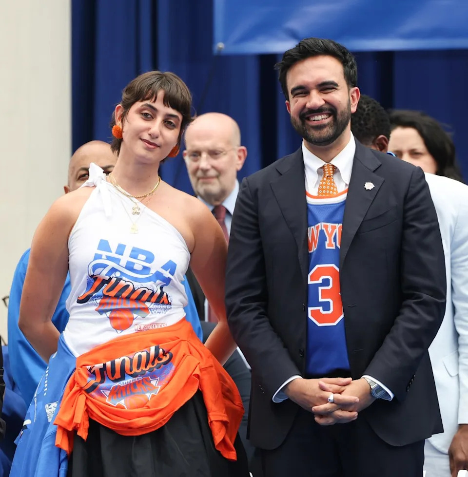 The first lady’s one-shoulder look was stitched together from bootleg NBA Finals merch tees. Kevin Mazur/Getty Images