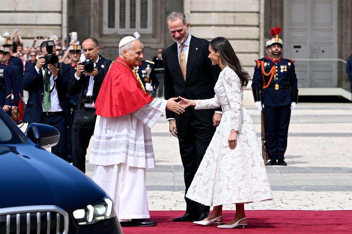 Queen Letizia's sophisticated white guipure lace design by The 2nd Skin Co. blended royal protocol with contemporary elegance.