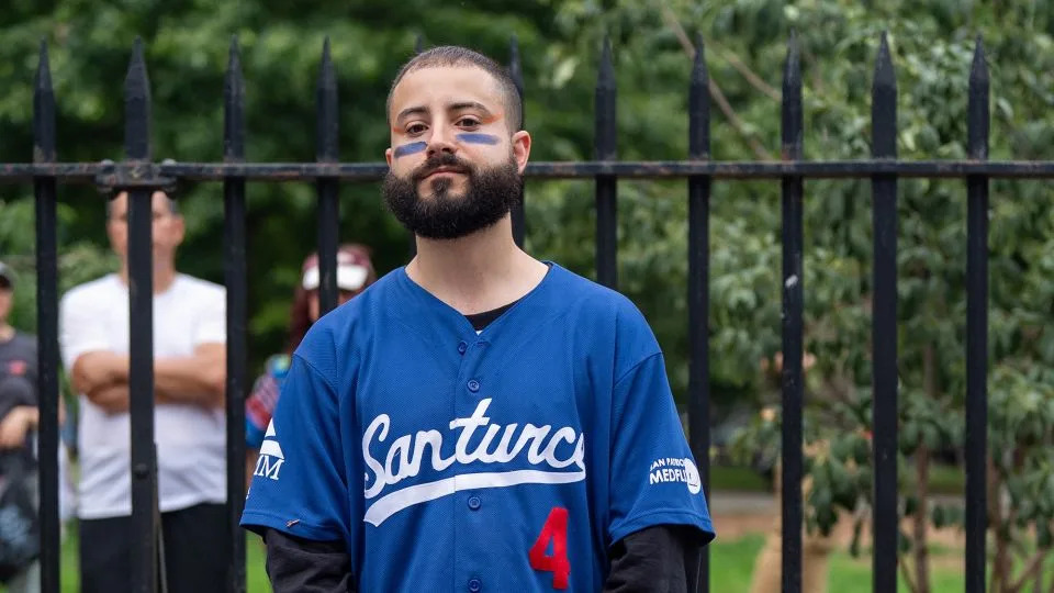 Abdiel attends the Puerto Rican Day celebration in a Santurce baseball jersey layered with a denim wrap skirt. - David Dee Delgado for CNN