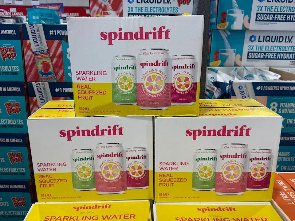 Several boxes of Spindrift sparkling water.