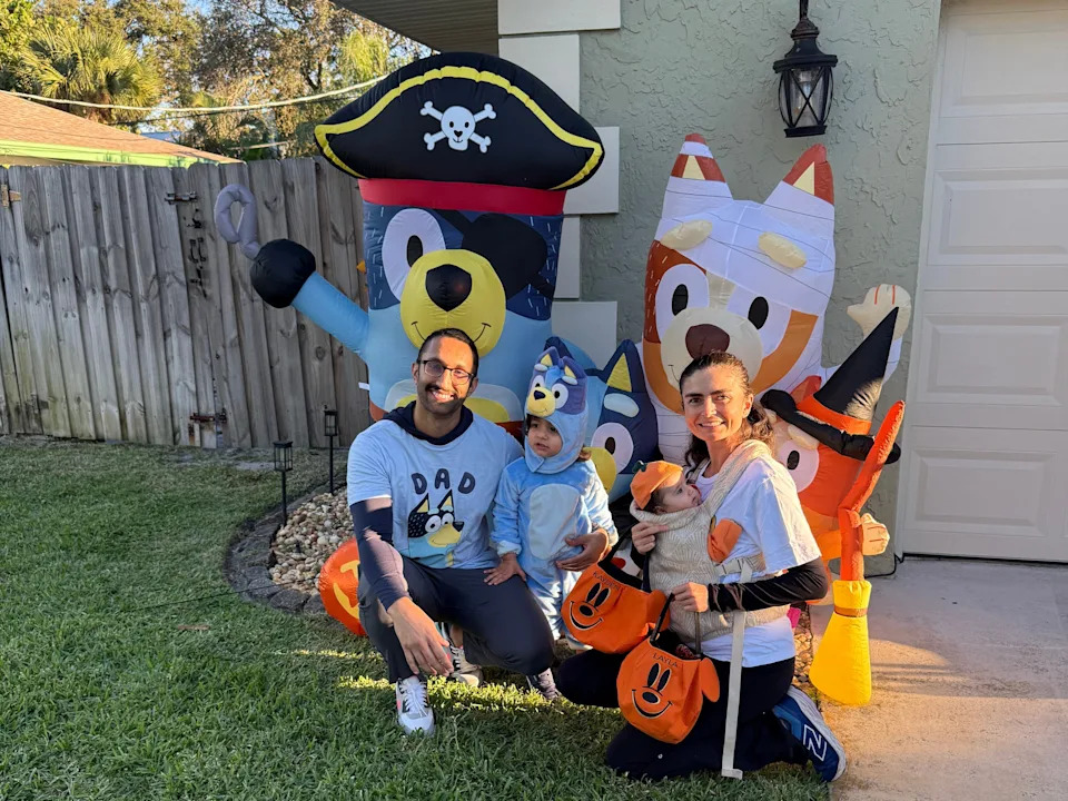 The writer and her husband and kids dressed up for Halloween in Florida.