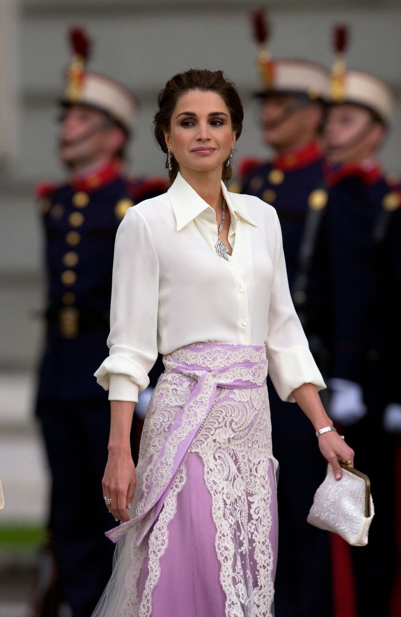 Queen Rania of Jordan made fashion history at the wedding of Felipe and Letizia in 2004 with her now-famous white blouse and long skirt combination.