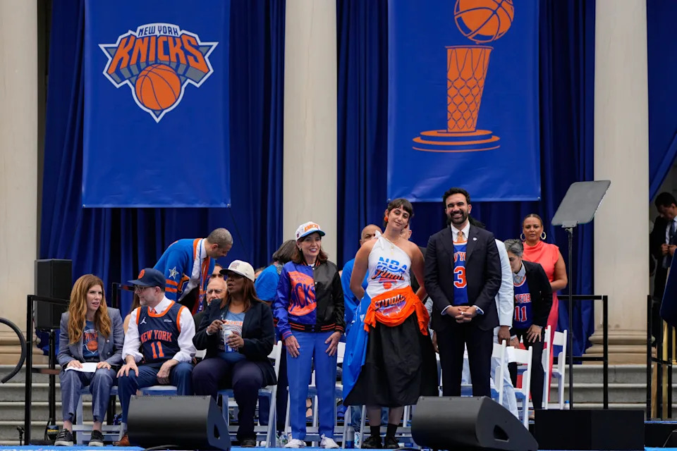 New York Mayor Zohran Mamdani, from right, his wife Rama Duwaji, New York Gov. Kathy Hochul, and New York Attorney General Letitia James react during the New York Knicks' NBA championship parade Thursday, June 18, 2026, in New York. (AP Photo/Yuki Iwamura)