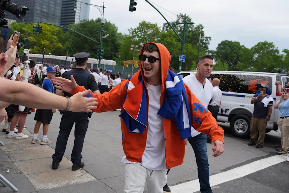 Timothee Chalamet greets fans during the New York Knicks' NBA championship parade Thursday, June 18, 2026, in New York. (AP Photo/Ryan Murphy)