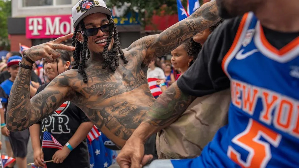 New York Knicks shooting guard and new NBA champion Jordan Clarkson attends the Puerto Rican Day celebration in Brooklyn. - David Dee Delgado for CNN