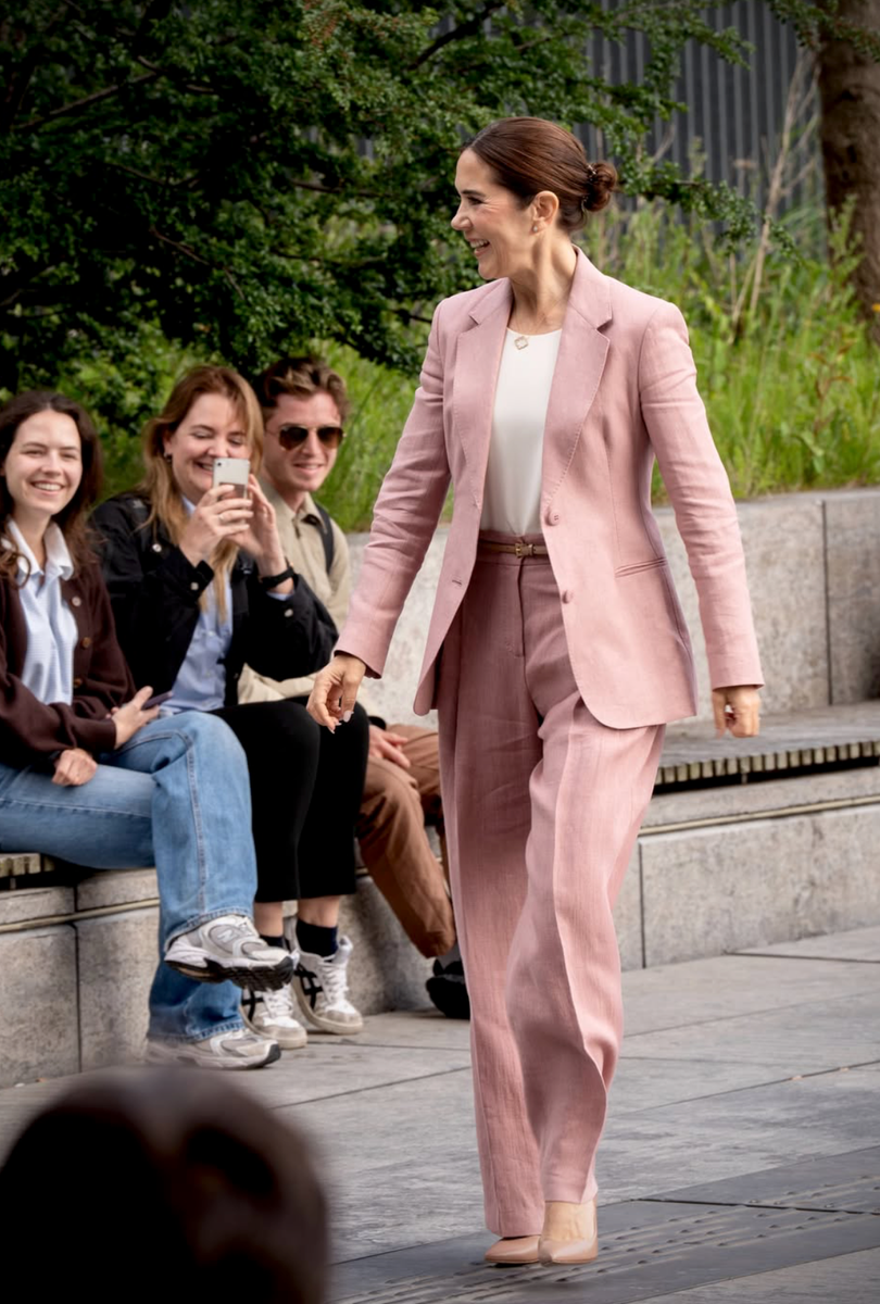Queen Mary completed the sophisticated look with natural makeup, nude pumps, and impeccably tailored separates that embodied modern royal dressing.
