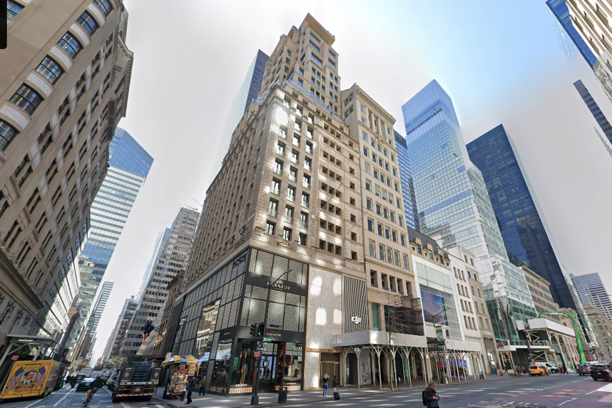 Google Street View of 685 Fifth Avenue, a tall light-colored building with dark-framed windows, flanked by other skyscrapers.