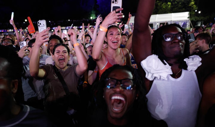 Knicks fans celebrate in Central Park on Saturday. (Photo by Kena Betancur / AFP via Getty Images)