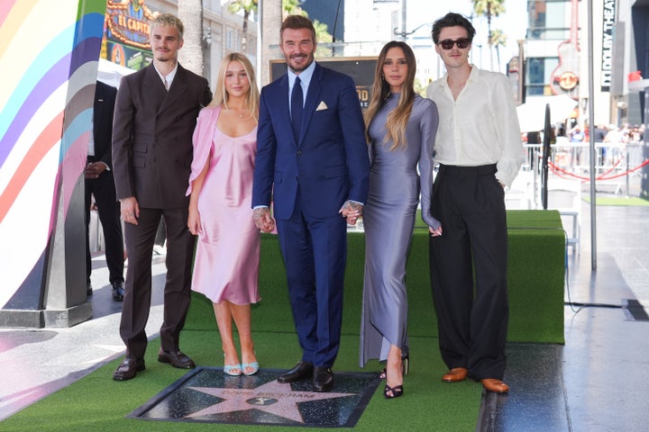 Sir David and Victoria Beckham with the youngest three of their four children last week