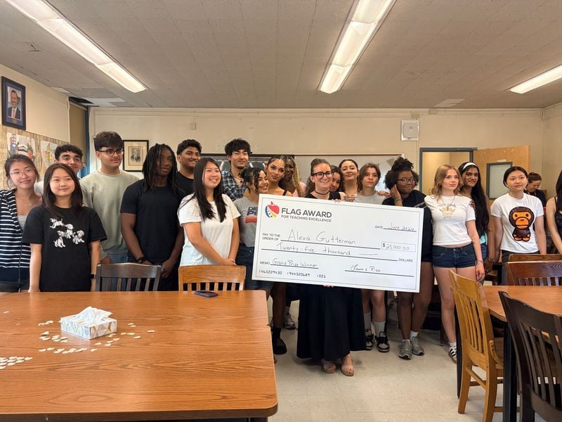 Verdict's in: Cardozo teacher wins Flag |