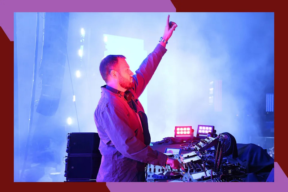 Chris Lake feels the crowd while performing in concert.